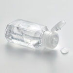 Flacon de gel hydroalcoolique transparent ouvert