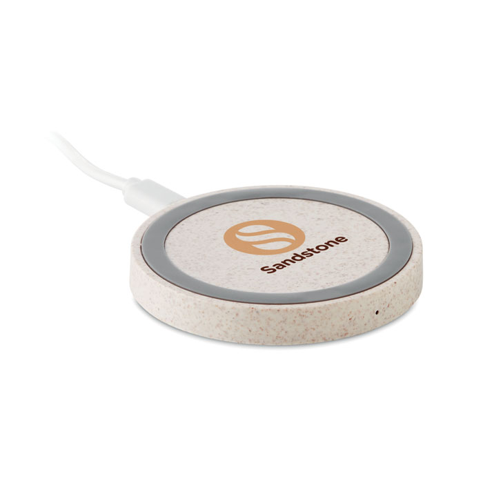 Chargeur sans fil rond beige connecté par câble