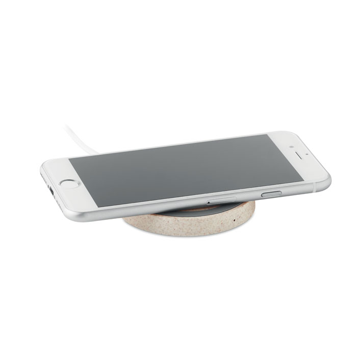 Smartphone sur chargeur sans fil rond