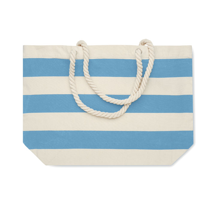 Sac de plage rayé bleu et blanc.