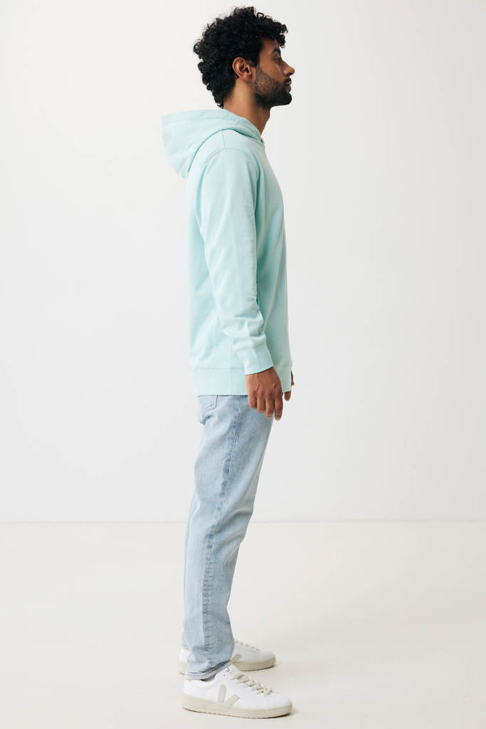 Homme en hoodie vert menthe de profil
