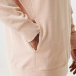 Sweat à capuche beige avec poche latérale