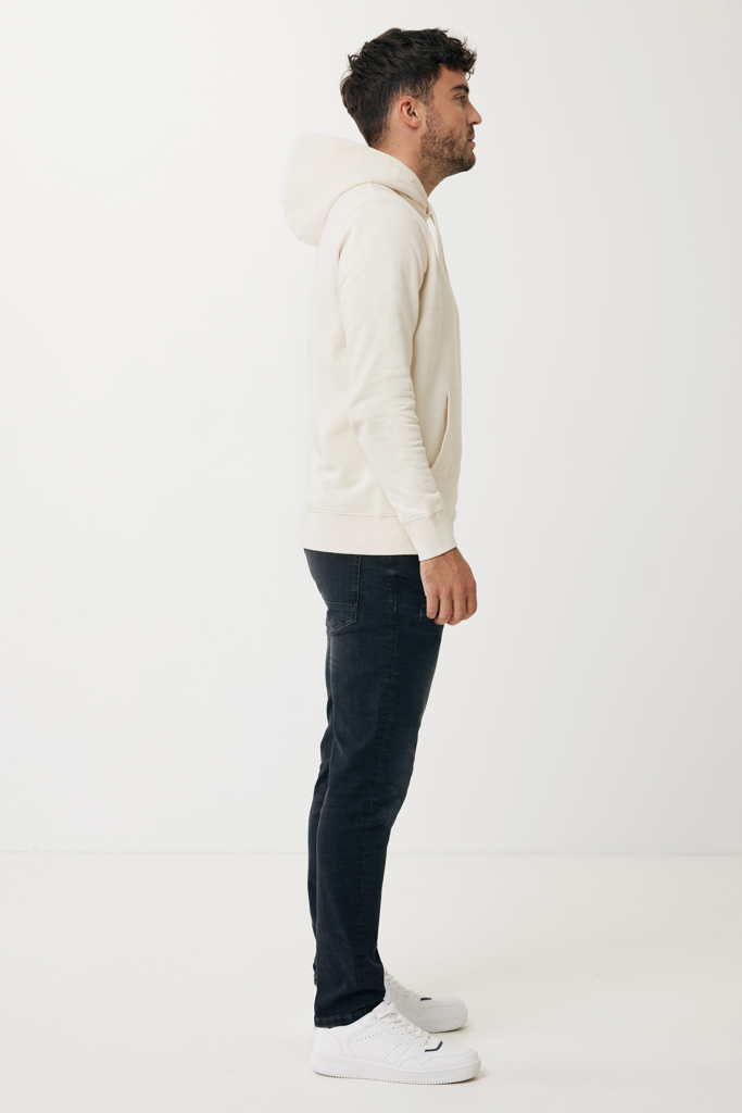 Homme en hoodie beige de profil