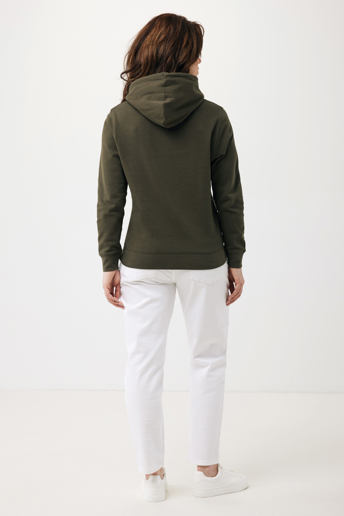 Femme de dos portant sweat vert à capuche