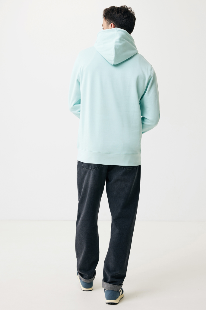 Homme de dos portant un sweat vert clair